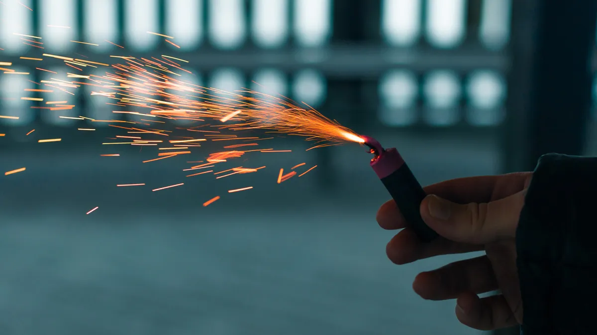 Sparks flying from a hand-held tool